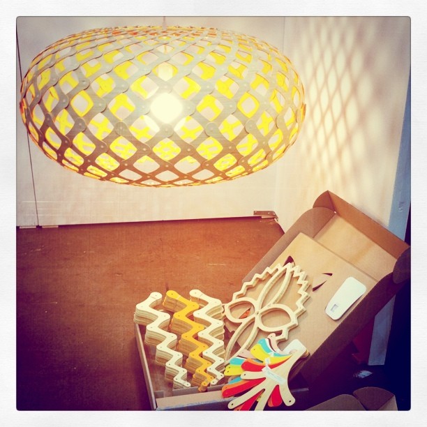 Assemble your own lamps into beautiful shapes. Natural wood on the outside, color on the inside.  (Taken with instagram)