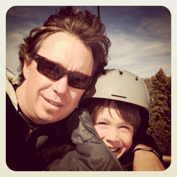 Me and my oldest on the lift or a day of boarding.  (Taken with instagram)
