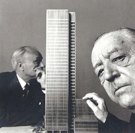 What are you looking at?
tgphipps:

Ludwig Mies van der Rohe and Philip Johnson pose with their model of the Seagrams Building