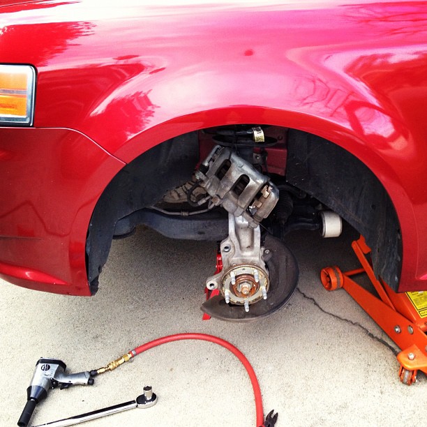 Just finished putting new brakes on my car. Pads and rotors. Pretty easy job.  (Taken with instagram)