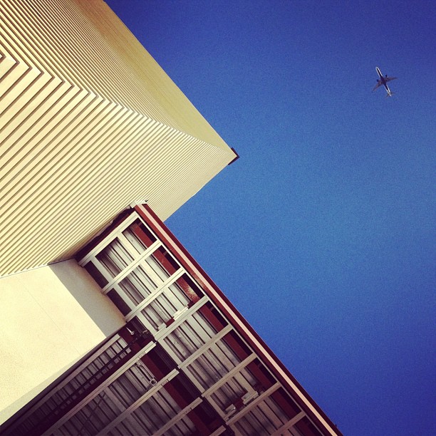I didn&#8217;t know the plane was there when I took this picture.  (Taken with Instagram at Elementary School #9)